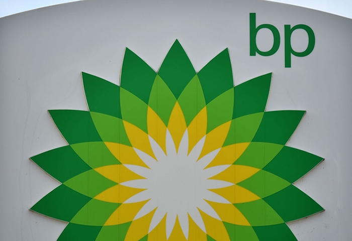 BP halves dividend after significant quarterly loss