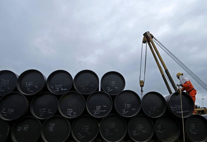 Oil prices plunge as OPEC trims demand forecast